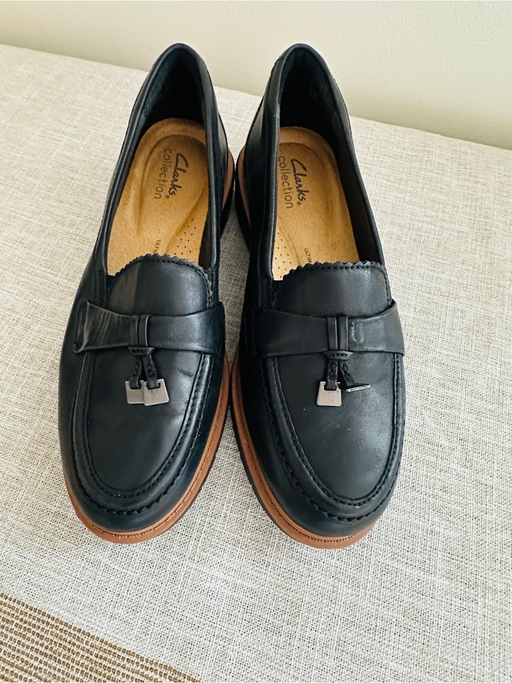 Clarks Black Leather Tassel Loafers with Brown Sole